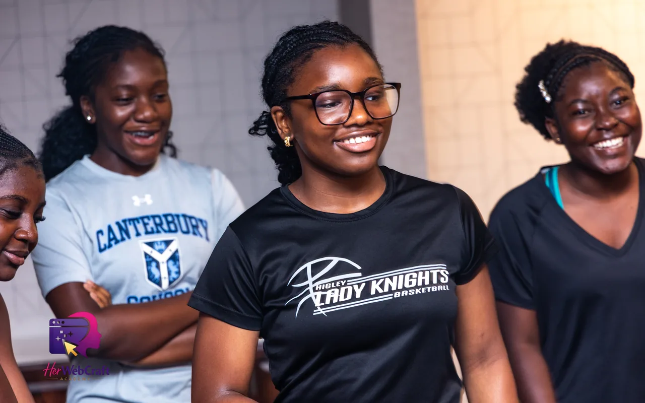 Cohort 1 students laughing together during a group activity